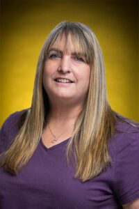 Headshot of Tracy M. - office administrator at RK Electric
